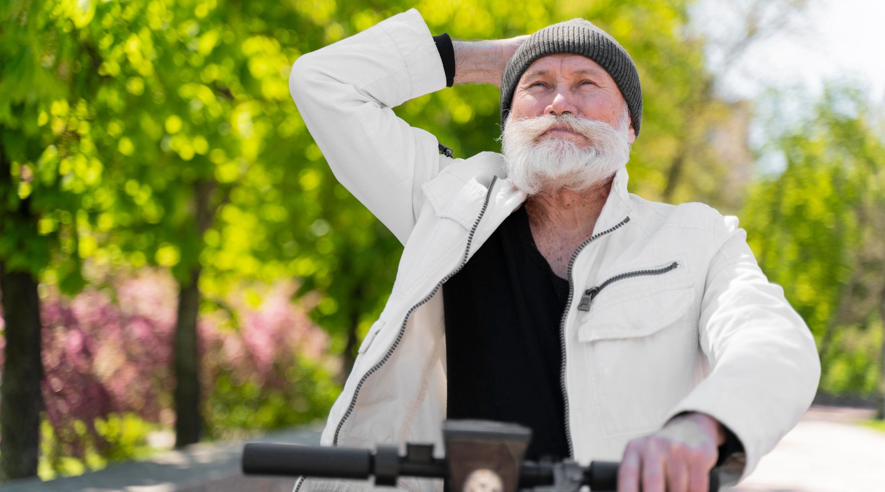 elder man looking happy with his mobility scooter